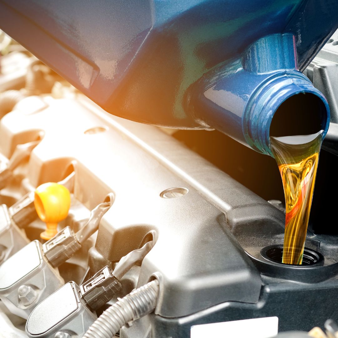 car engine getting filled with oil